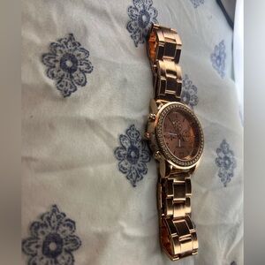 Woman’s gold watch